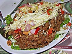 Crispy catfish salad, with green mango dressing, at Toh Plue