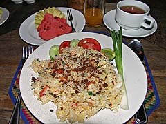 Breakfast fried rice with flavorings sprinkled on