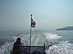 Ferry wake looking back toward the mainland