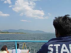 Anticipating a hot shower as we approach the mainland
